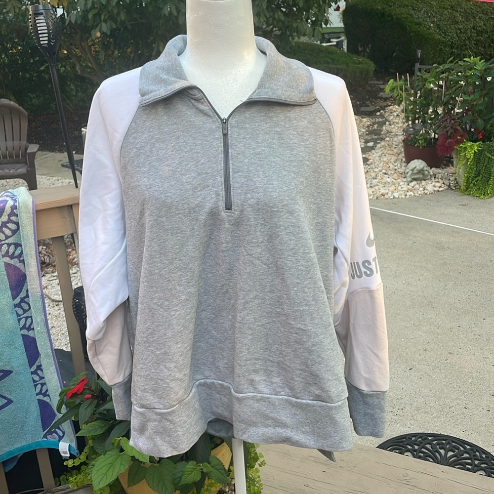 Nike Sweatshirt. White and tan sleeves with a grey mid torso section.